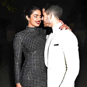 Pix: Priyanka-Nick can't keep their hands off each other