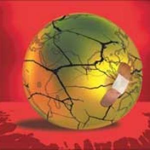 Global recovery may take some more time: Gokarn