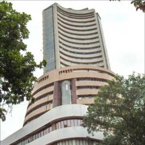 Sensex ends flat; banks gain