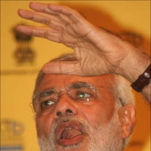 Cong trying to run parallel govt through governor's office: Modi