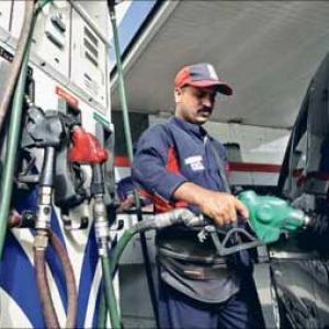 Petrol price hiked by Rs 2.96