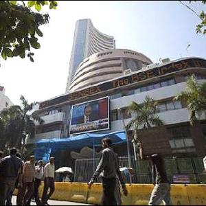 Markets open strong, kisses 18K on global cues