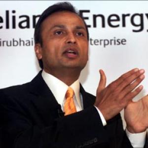Anil Ambani, 2 firms barred from markets till 2012