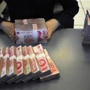 Chinese yuan seen depreciating further; rupee to remain stable