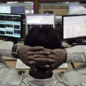 Nifty hovers around 5,950; Financials weigh
