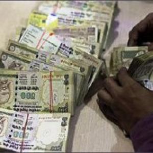 Rupee loses initial gains, up 10 paise