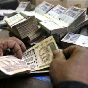 Rupee free fall continues, ends down 13 paise to 67.27