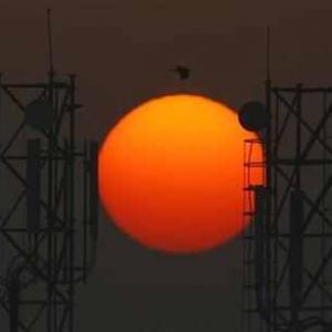 Telcos pay Rs 10,808 cr, help govt keep fiscal deficit in check