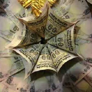 Rupee advances 12 paise against dollar