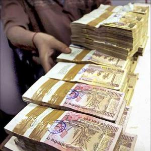 Rupee up by 36 paise against dollar in early trade