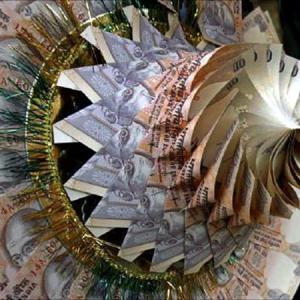 Rupee recovers by 13 paise against dollar in early trade