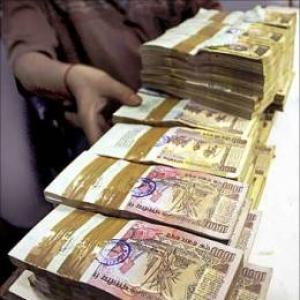 Rupee up 26 paise Vs dollar in early trade