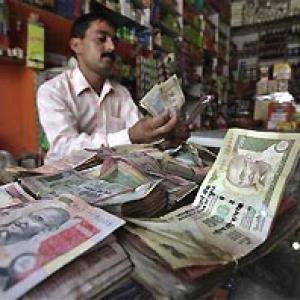 Rupee fall hits middle income group hard: Assocham