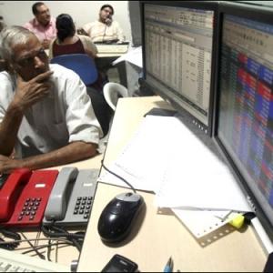 Markets end higher led by auto, oil & gas stocks