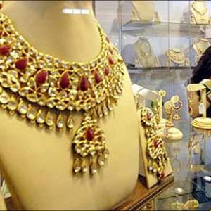 Gold, silver fall on global cues, low demand