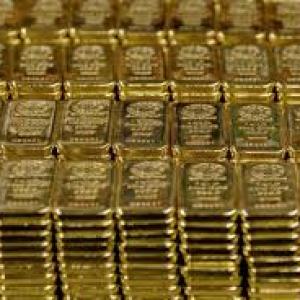 Gold eases on low demand; global cues