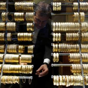 Gold tanks to 10-month low as RBI eases import curbs