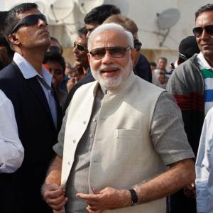 Modi pleases India Inc with tax talk