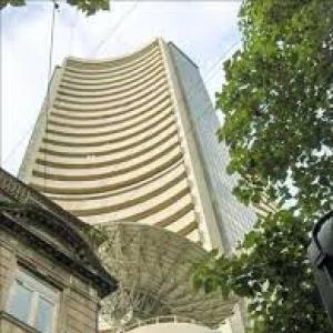 Markets consolidate; Sensex defends 25k