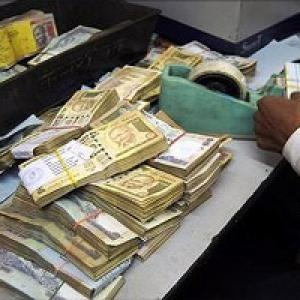 Rupee down 38 paise against dollar in early trade