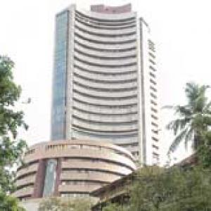 Sensex, Nifty dip on profit taking; Defensive shares rally