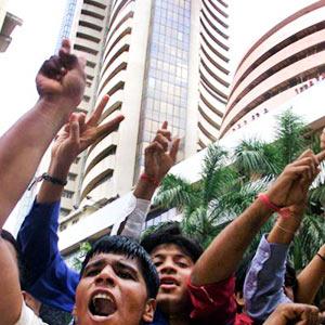 Market ends at record highs; Sensex tops 25,000