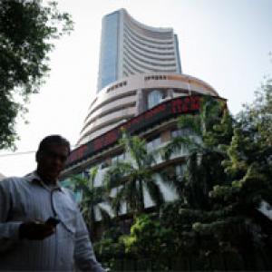 Indices slip on poor WPI data; Axis Bank, L&T top losers