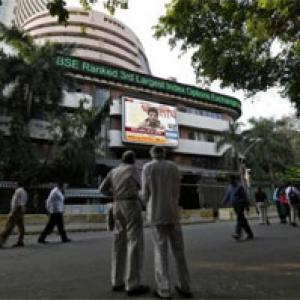 Sensex hovers around 25,300; Infosys gain, ONGC slips 3%