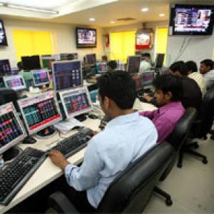 Markets trading flat; Bajaj Auto up 2%
