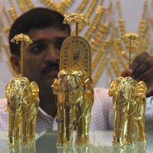 Buying gold? Hold on, prices may drop further