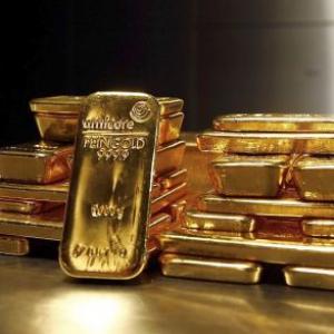 RBI scraps 80:20 gold import curbs; price may come down