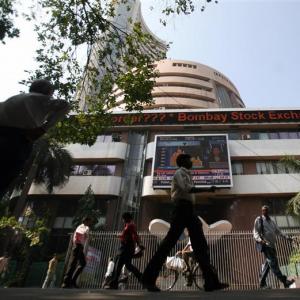Sensex ends at 27,098 ahead of F&O expiry, Fed meet outcome