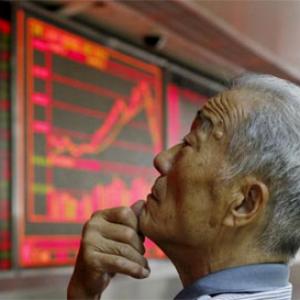 Great fall of China sinks world stocks, dollar