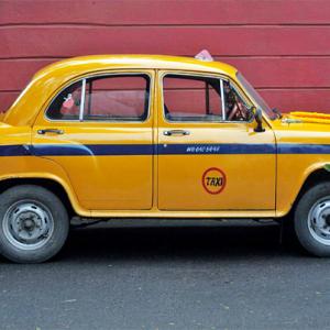 Old meets new: Kolkata's yellow cabs say Ola!