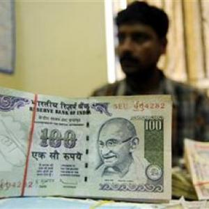 Rupee down 16 paise against dollar