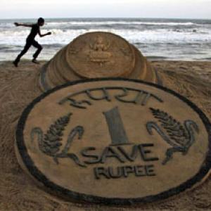 Rupee down 17 paise against dollar in early trade