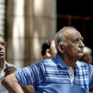 Sensex recovers losses but still under pressure; midcaps fall