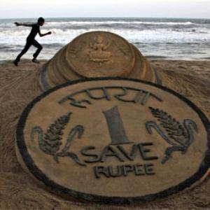 Rupee ends flat at 63.60 against US dollar