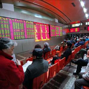 China stocks tumble as regulator warns of 'panic'