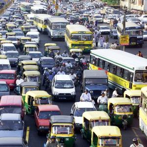 Choking Delhi vows pollution tax, car-free days to improve air