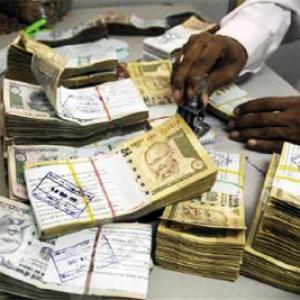 Rupee bounces back from 3-week lows, up 30 paise