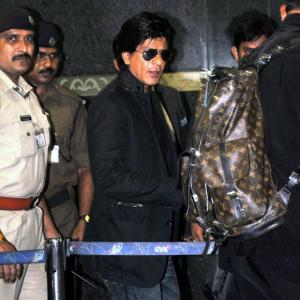 PIX: Shah Rukh Khan, Asin leave for Vancouver