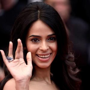 HOLY WOW: Mallika is spectacularly sexy in Cannes