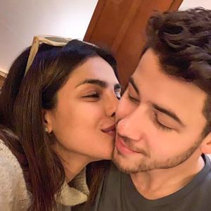 Why is Priyanka honoured to be kissing Nick?