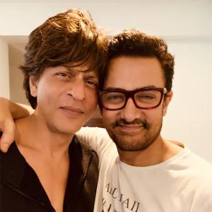 Beat That! SRK gets a warm hug from Aamir