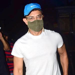 \Who was Aamir watching a film with?