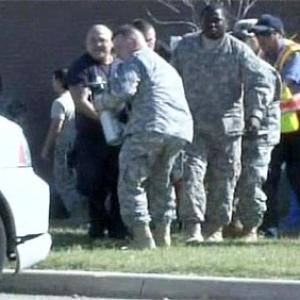 merica reacts with shock, grief at army base shootout 