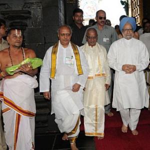 Image: Dr Singh goes barefoot at Tirupati temple