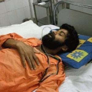 'Nigamananda slipped into coma after he was poisoned'