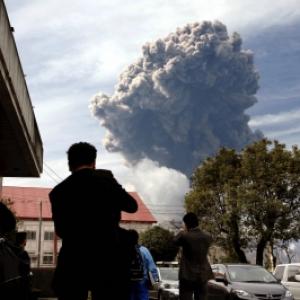 After tsunami and quake, volcano erupts in Japan